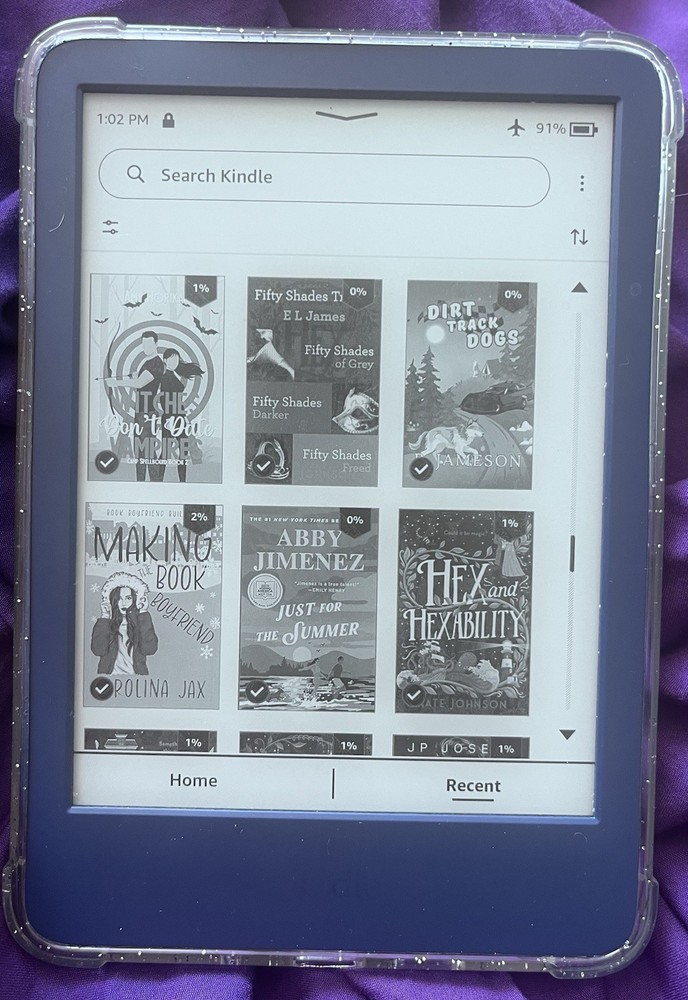 Amazon Kindle ereader Blue with books