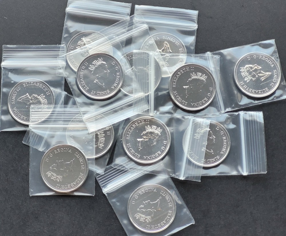 ***CANADA 25 CENTS 2000 MILLENNIUM *** FROM MINT ROLLS ***