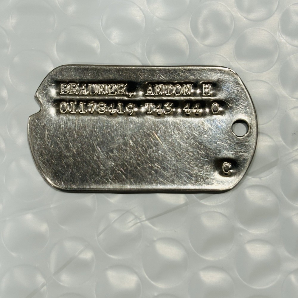 WWII US Notched Dog Tag Named Anton E Brauner T43 - 44 Military