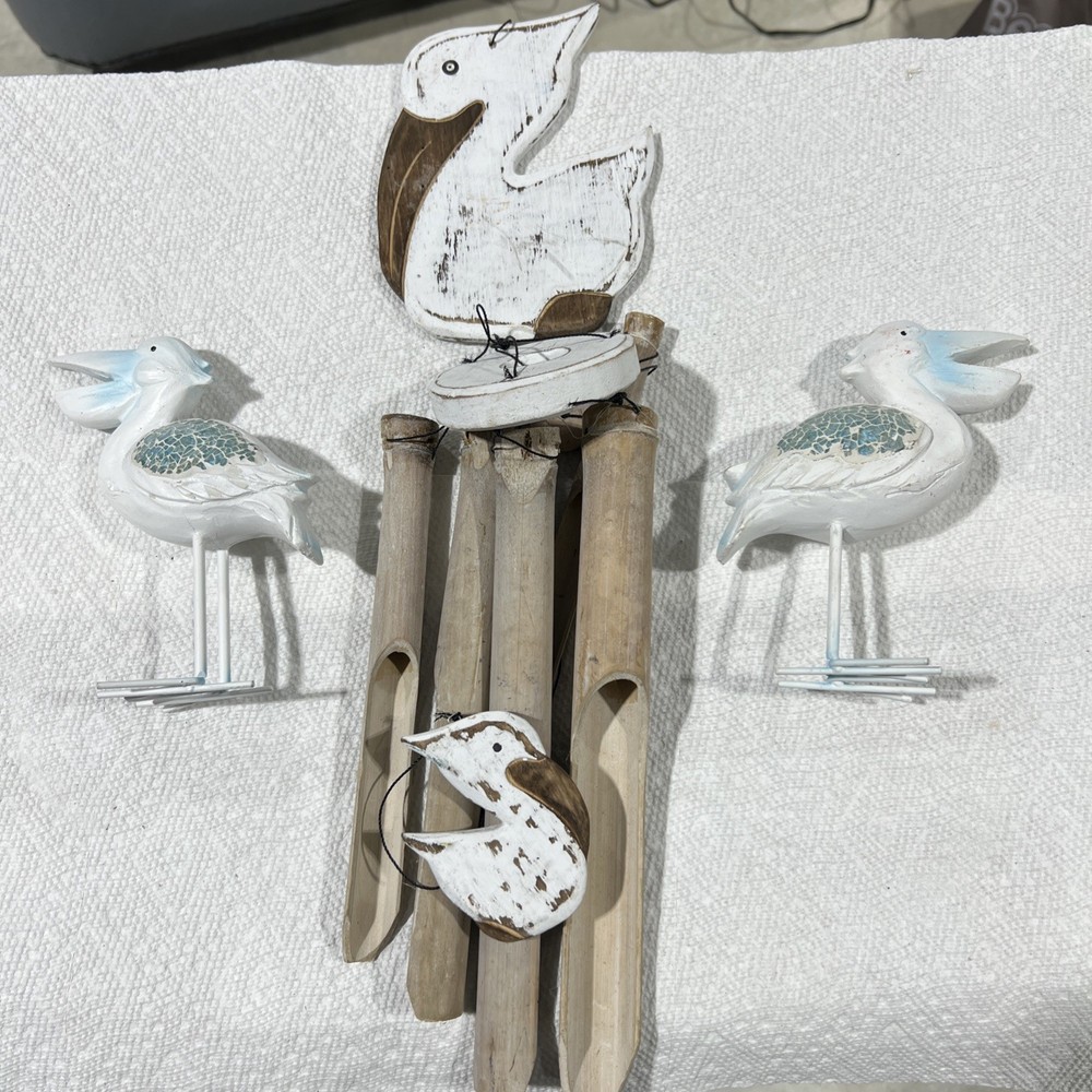 Pelican Wind Chimes & Statues