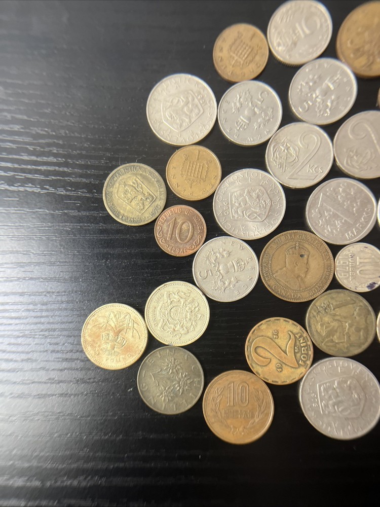 34 International Coins.