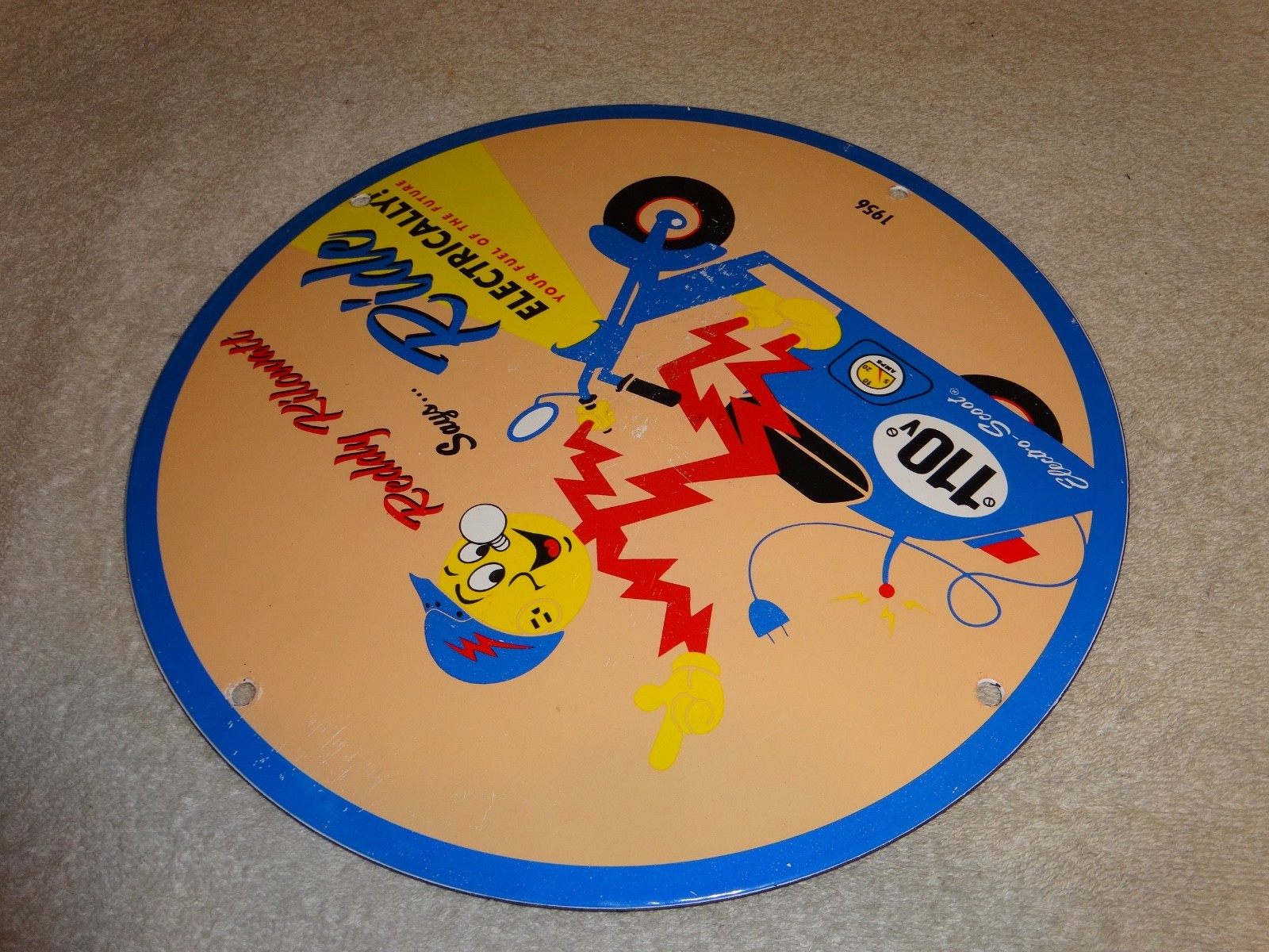 VINTAGE 56 REDDY KILOWATT ELECTRIC SCOOTER 11 3/4" PORCELAIN METAL GASOLINE SIGN