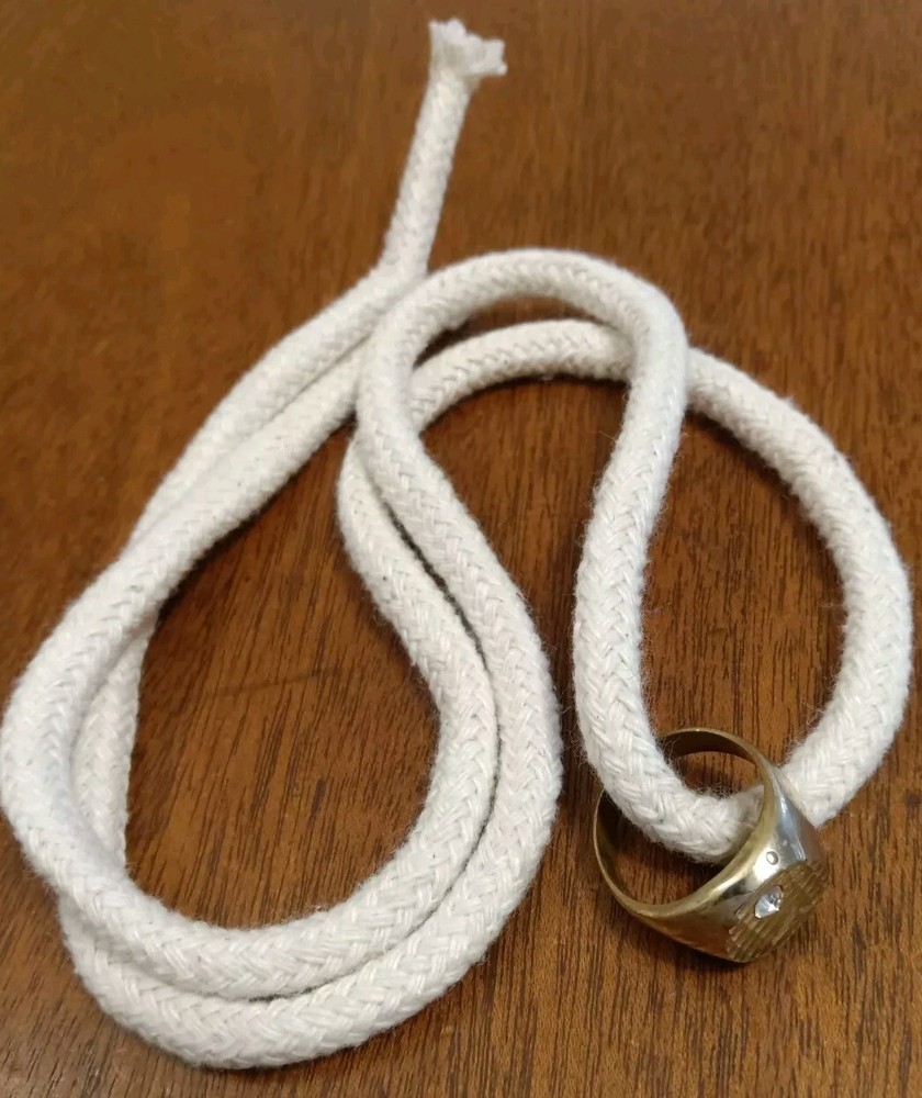Finger Ring: Rope Penetrates Ring Twice - Close-Up Magic