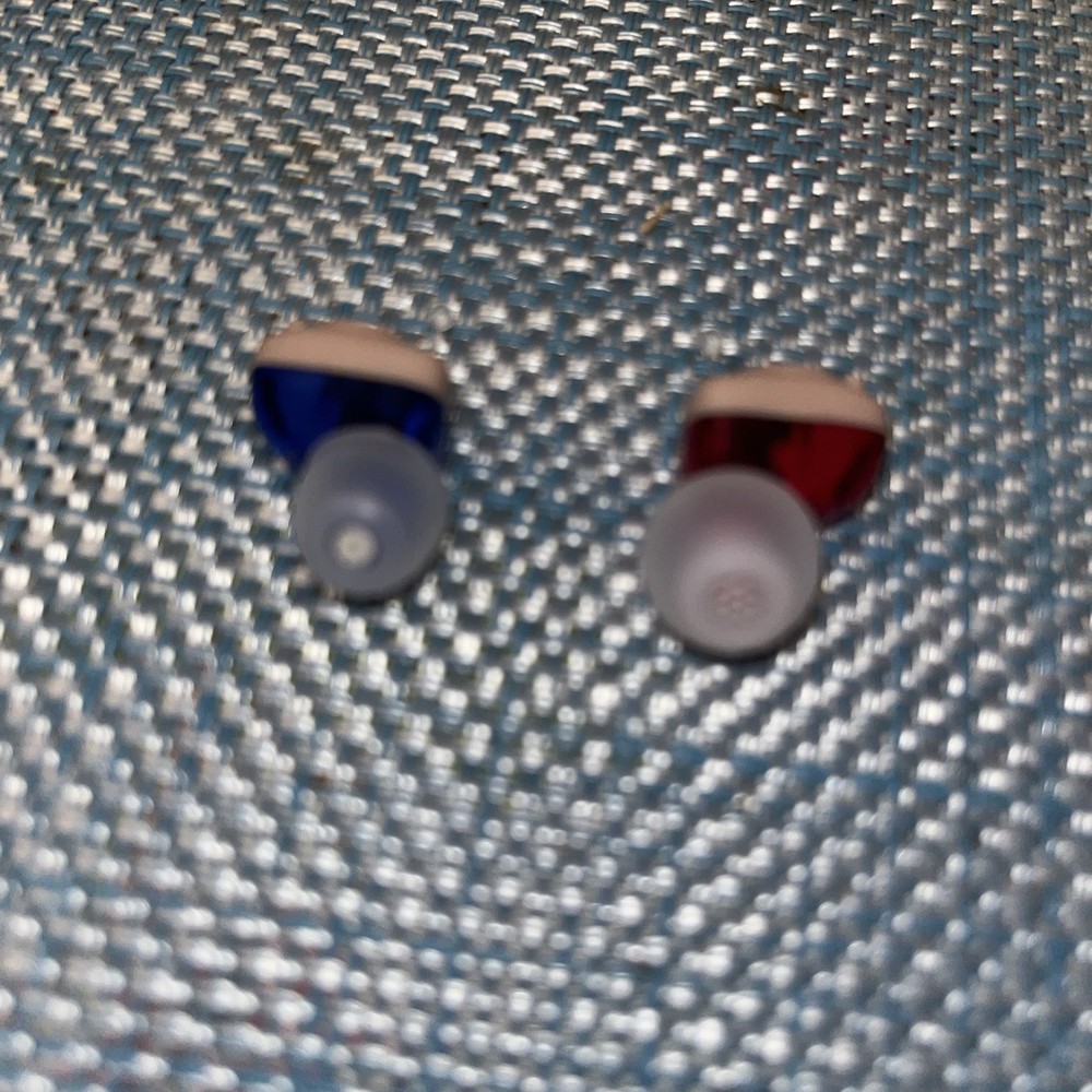 In-Ear Hearing Amplifiers, Rechargeable, with new tips, excellent condition.
