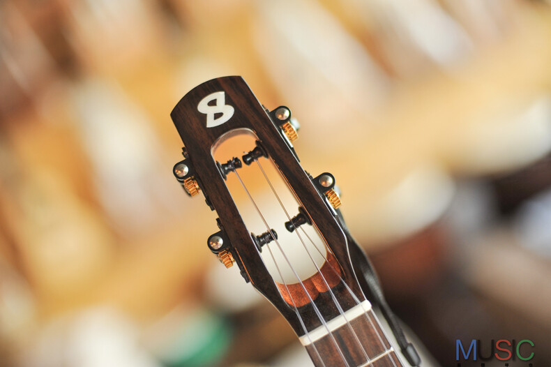 Bright Sun Solid Koa Cutaway Tenor Ukulele (Blue Stone Inlay)