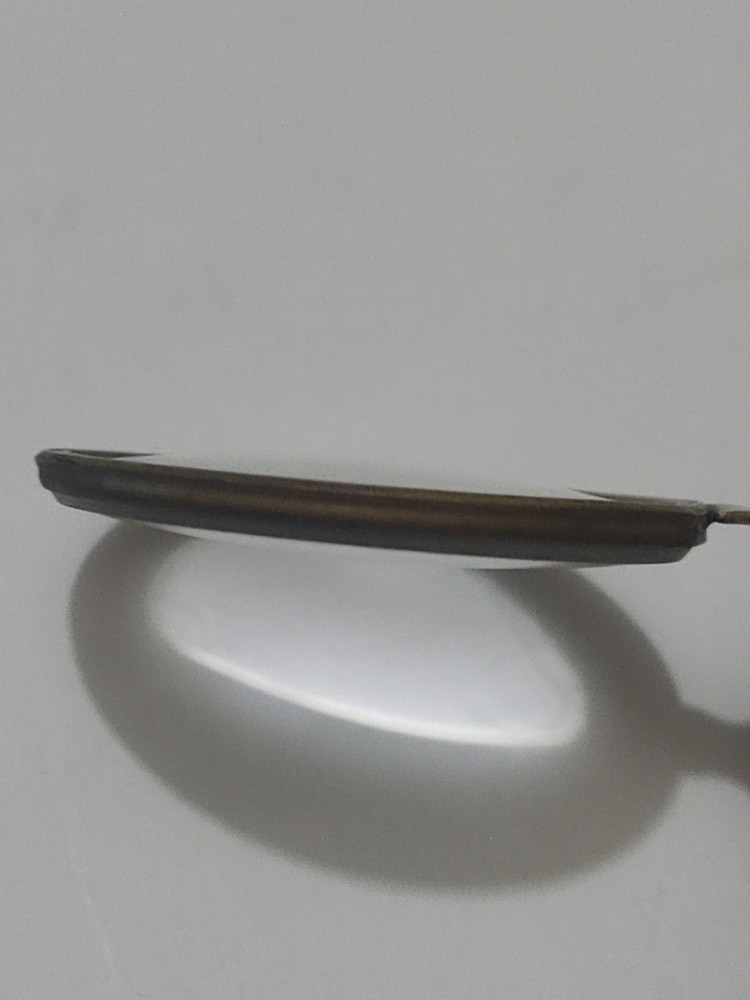 Antique magnifying glass.