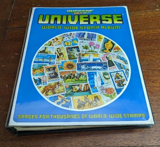 Hygrade Universe World Wide Stamp Album Blue Cover With Some Postage Stamps