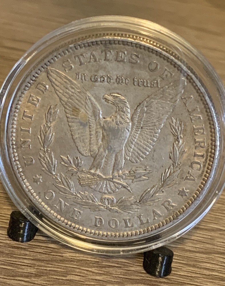 1887 Morgan silver dollar In Plastic Case