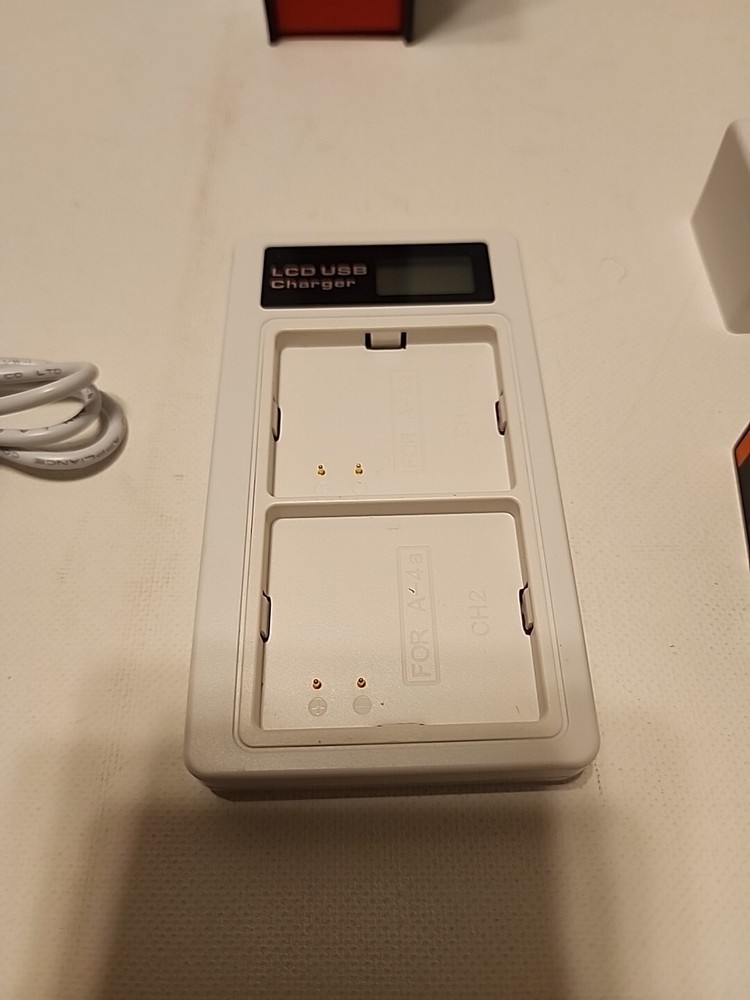 2-Pack Battery and Charger video/ Digital Camera.