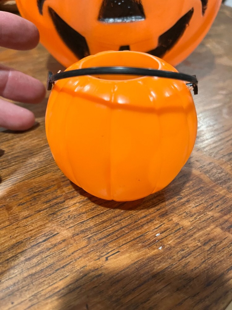 Two jack o lantern pumkins