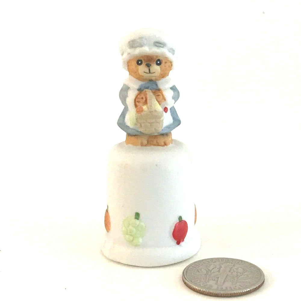 FOUR COLLECTABLE CERAMIC THIMBLES