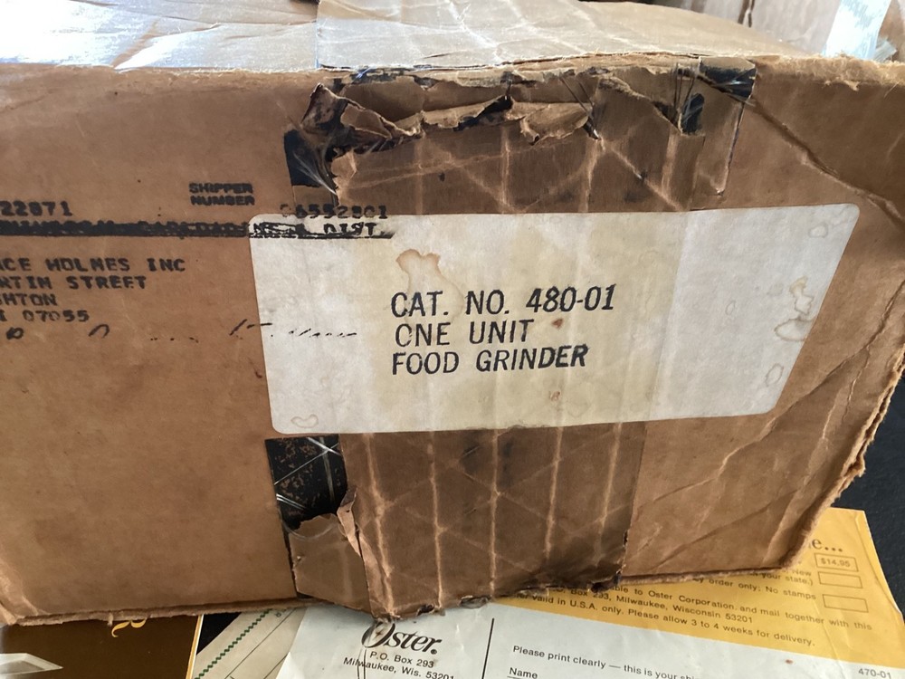 Oster Food Grinder Model 480 E, with attachments, and original paperwork