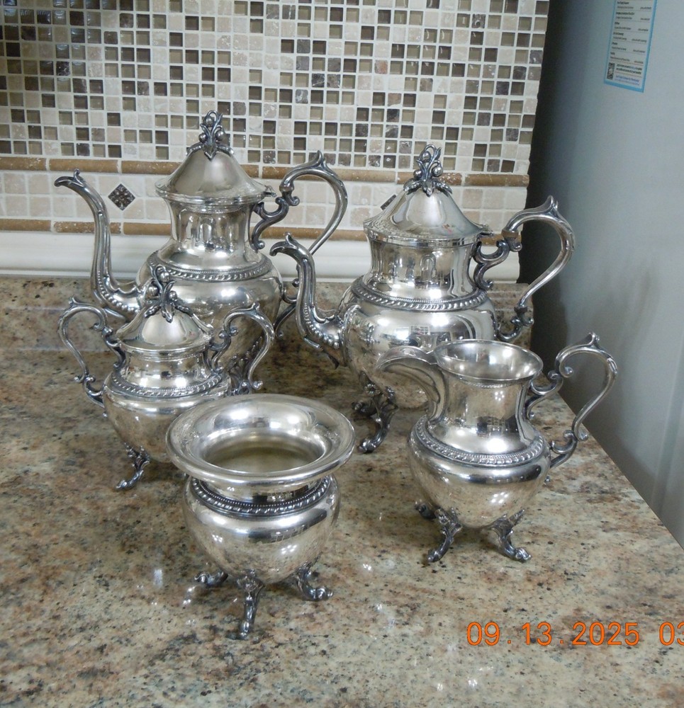 VINTAGE COFFEE AND TEA SET WITH CROWN AND MARKS