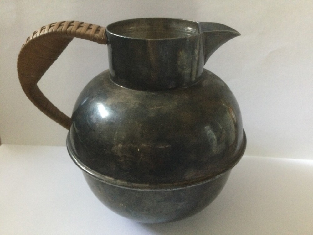 vintage silver plated pitcher with rattan handle
