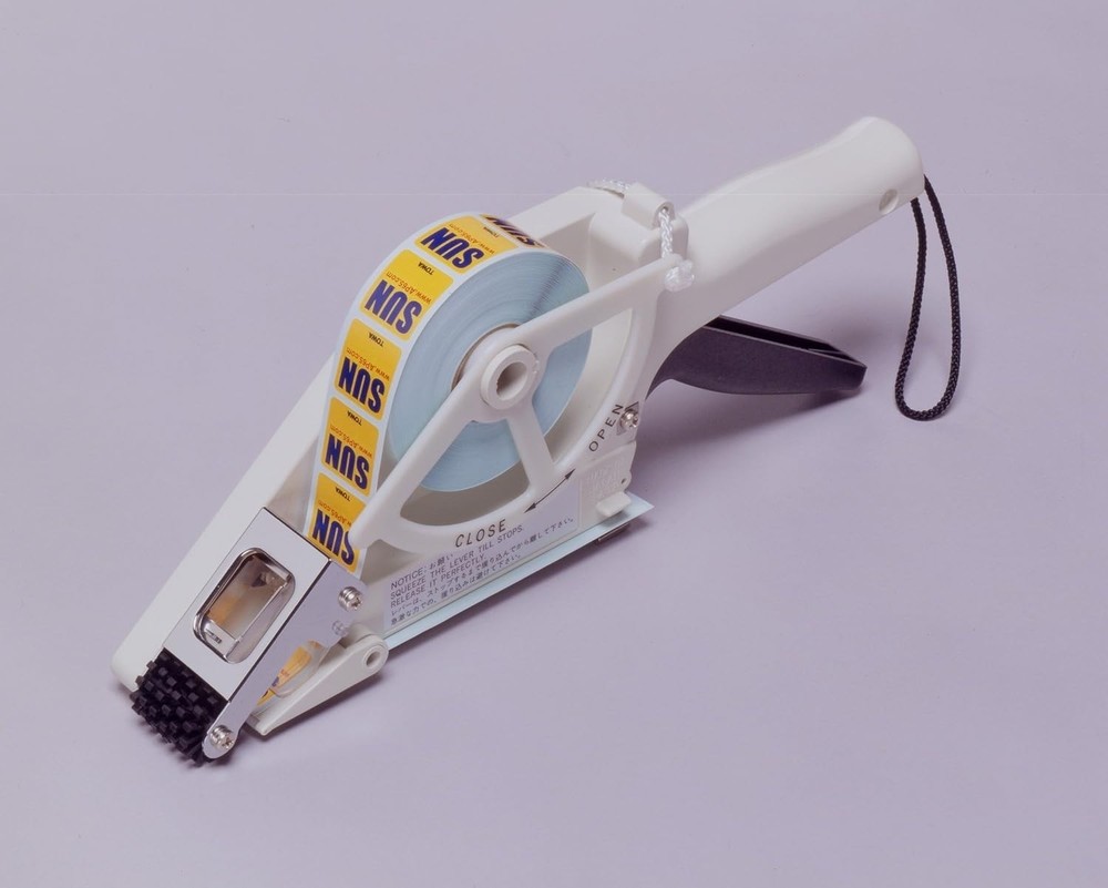 Handheld Label Applicator with Adjustable Carriage for Precise Labeling