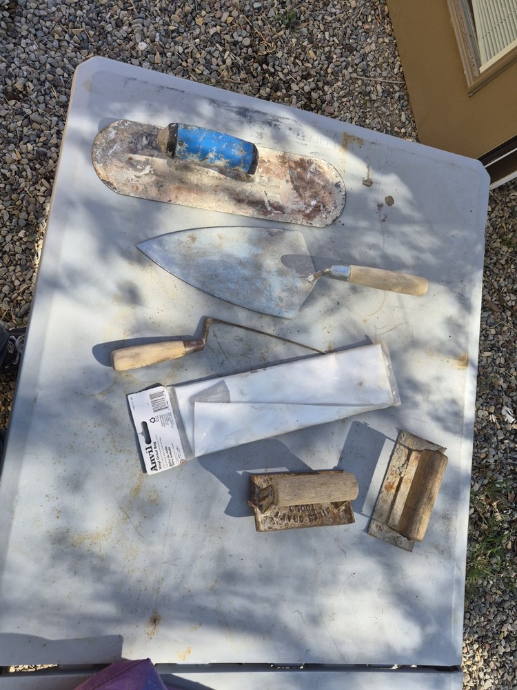 Masonry Tools And Notched Towels