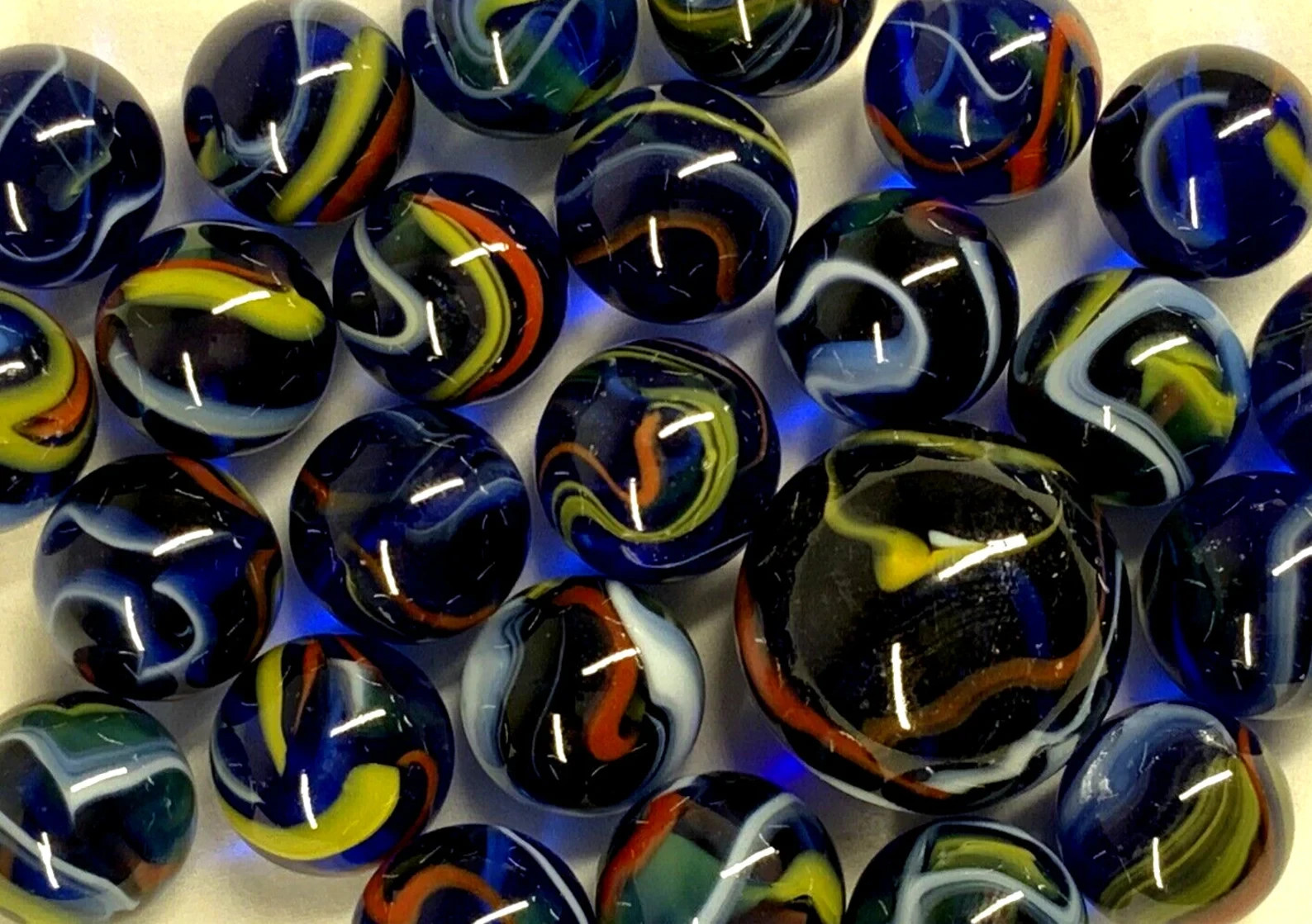 25 Glass Marbles ECLIPSE Translucent Blue Red/Yellow Swirl Pack Shooter