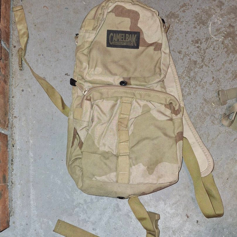 Preowned OlderGen CamelBak MULE hydration pack Desert Combat Uniform DCU Pattern