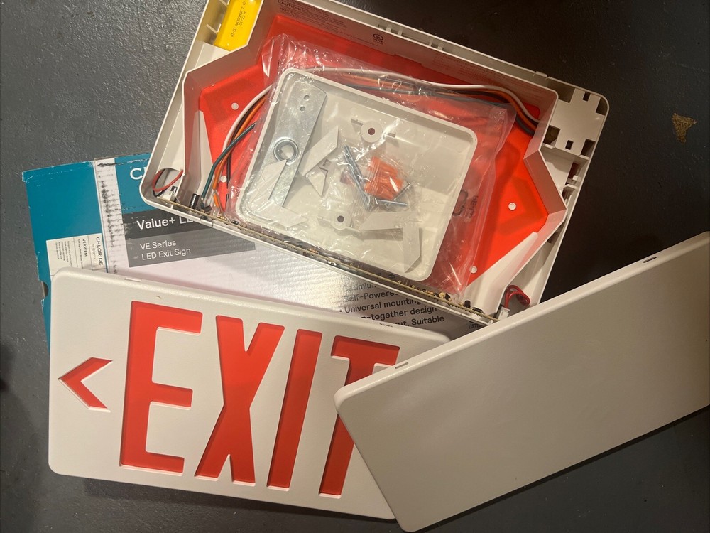 Chloride LED Exit Sign Stencil Face Red Letter White Housing
