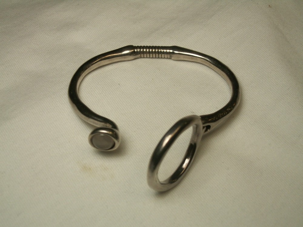 ...Unode50...Silver Tone, Quartz Hinged Bracelet...
