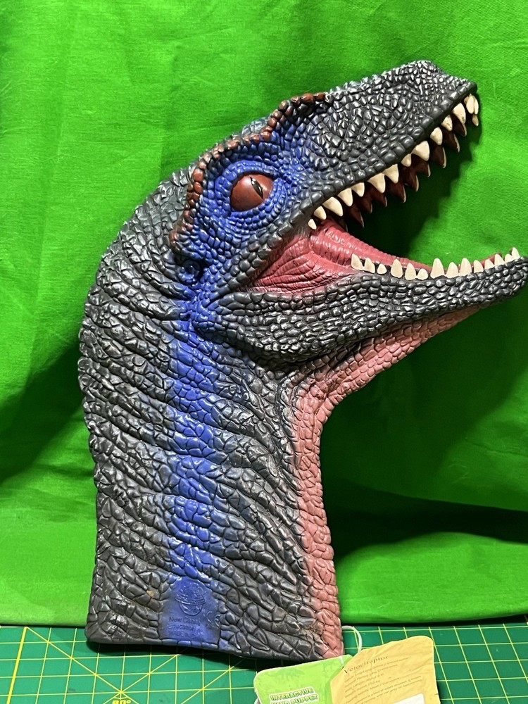 Velociraptor head childrens plastic hand puppet dinosaur