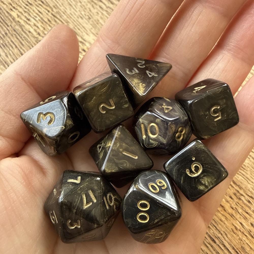 Crystal Caste Ancient / Goldmist - Black - Complete  7 dice Set + 2 Extra D6