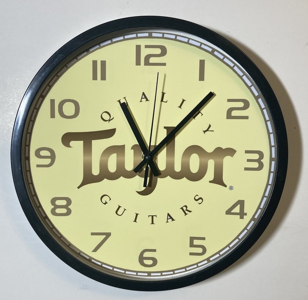 Taylor Guitars Logo Battery Operated Wall Clock