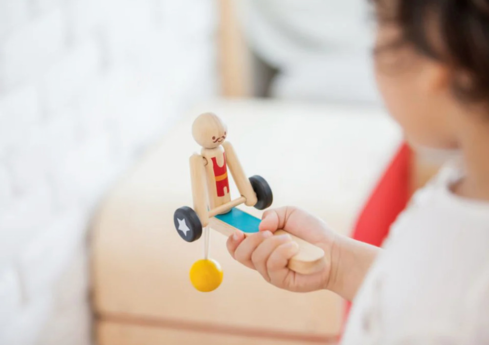 Plan Toys Weightlifting Acrobat. Eco-friendly.