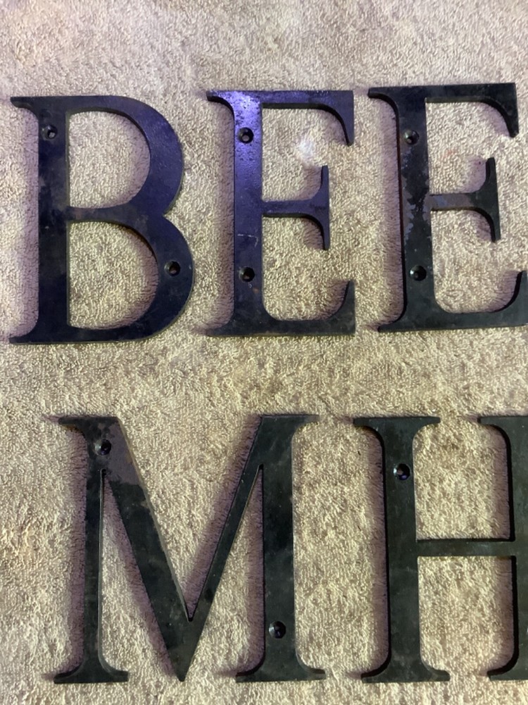 Eight 6" steel letters