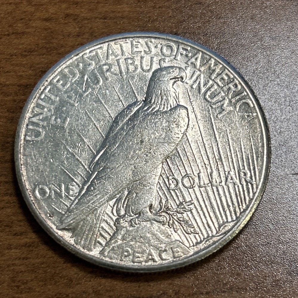 1925-S $1 Peace Silver Dollar AU+