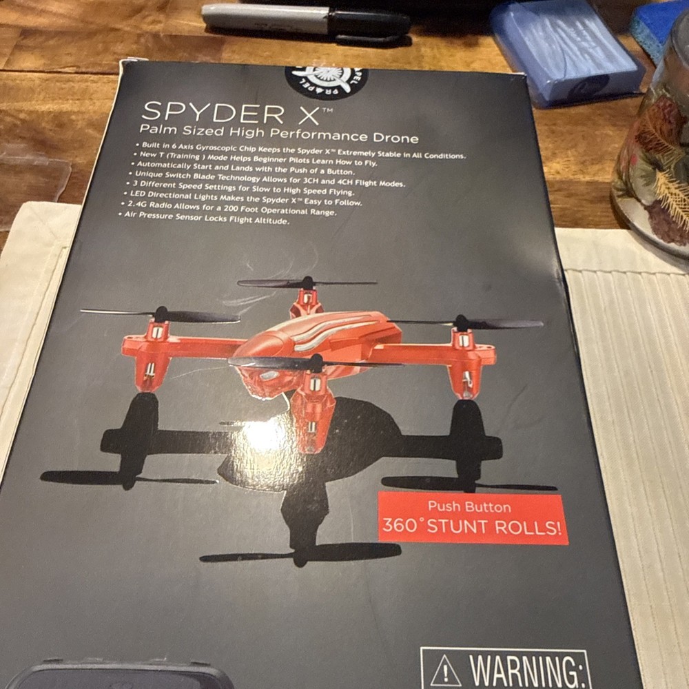 new Spyder X palm size high performance drone red