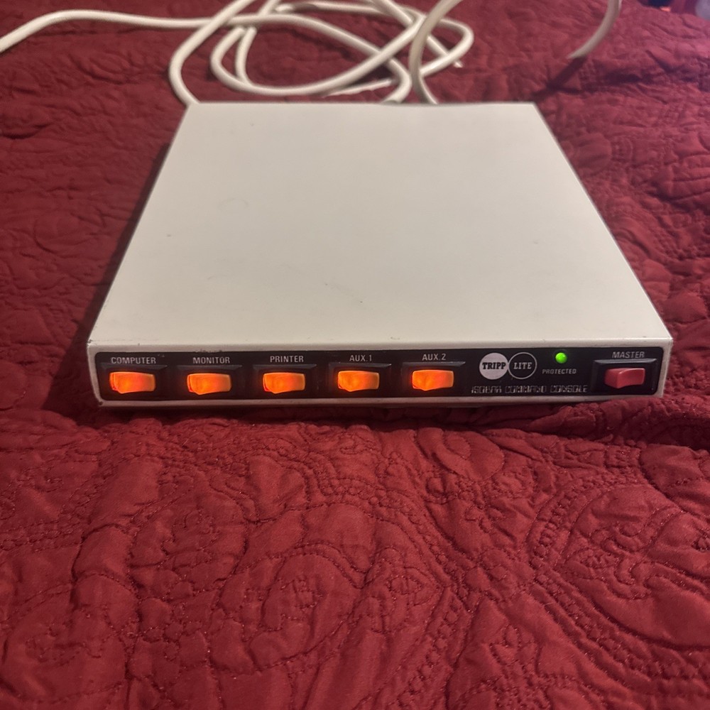 Tripp Lite Command Console Model CCI 6-12 6 outlet Transient Surge.