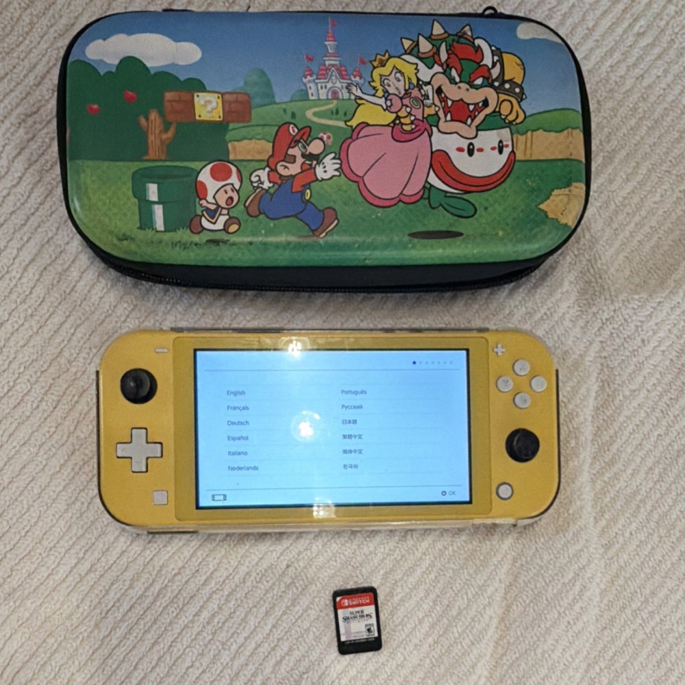 Nintendo Switch Lite Yellow Console Bundle w/ Super Smash Bros Ultimate & Mario…
