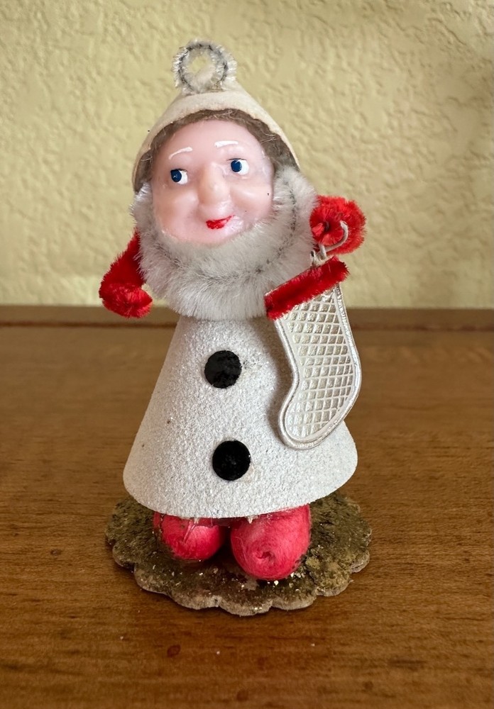 VINTAGE CHRISTMAS ELF HOLDING STOCKING