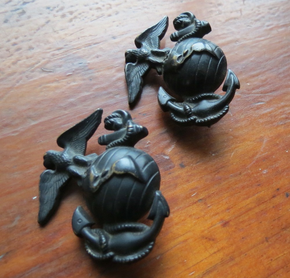 2 US MARINE CORPS HAT or UNIFORM EMBLEMS