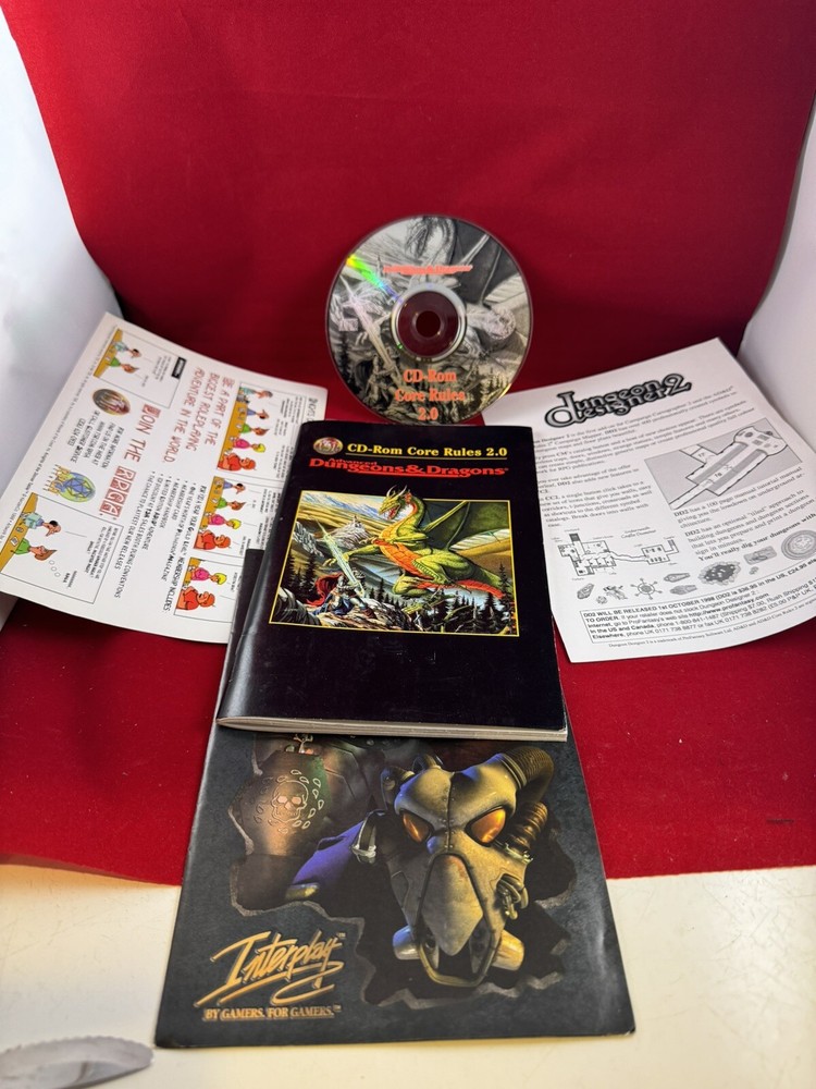 Advanced Dungeons & Dragons CD-Rom Core Rules 2.0 manual and paperwork.