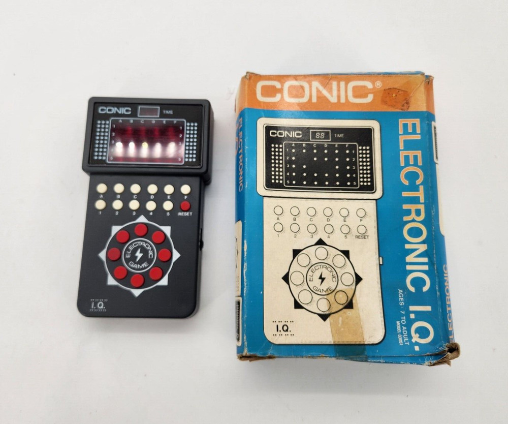 Conic hand held electronic IQ game model 003501 Tested With Box