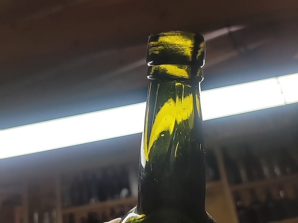 Early Wine Bottle With Etching