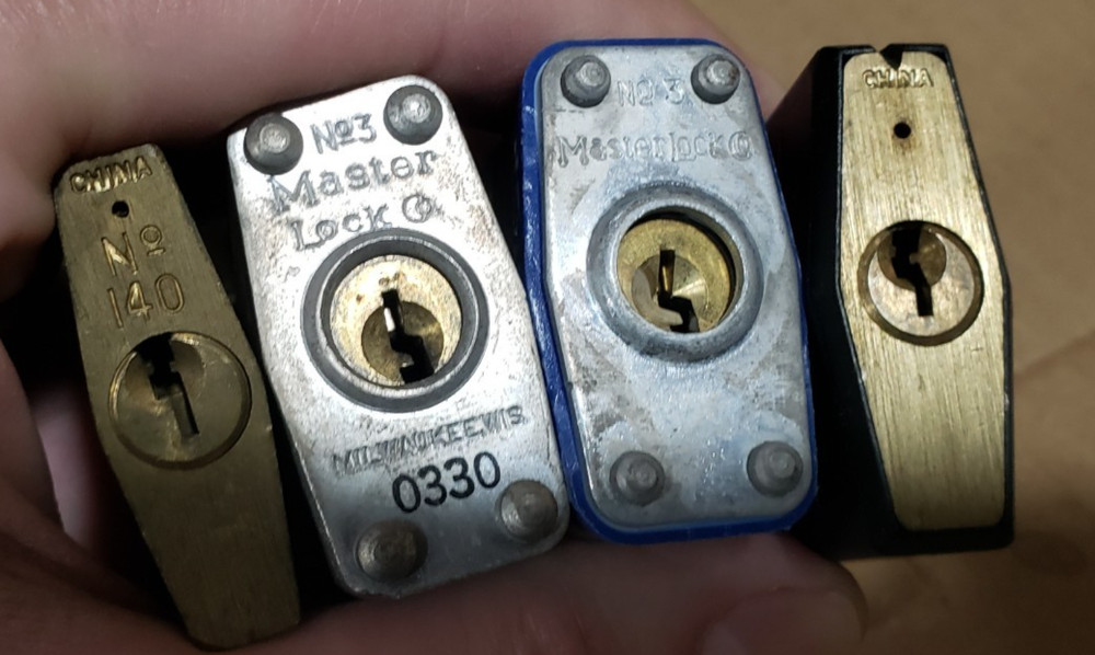 6 Master Locks Padlocks and 2 smaller Corbins