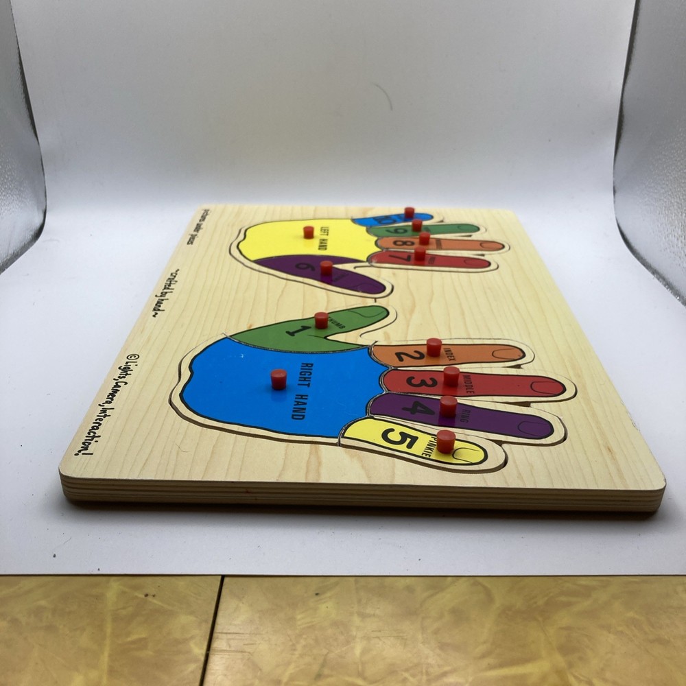 Melissa & Doug Hand Peg Wooden Puzzles