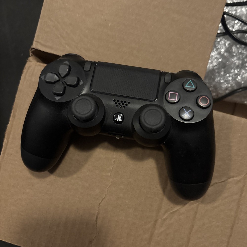 Playstation 4 Console with controller and seven games