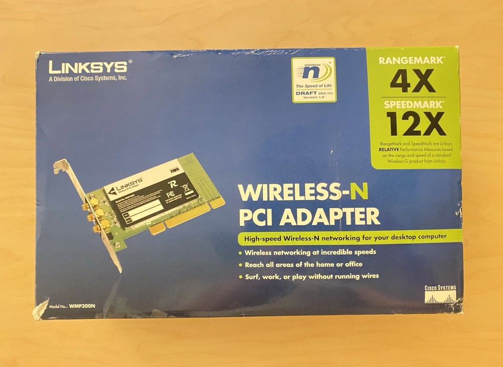 Linksys WMP300N Wireless‑N PCI Adapter With Box & Antenna Base (System Pull)