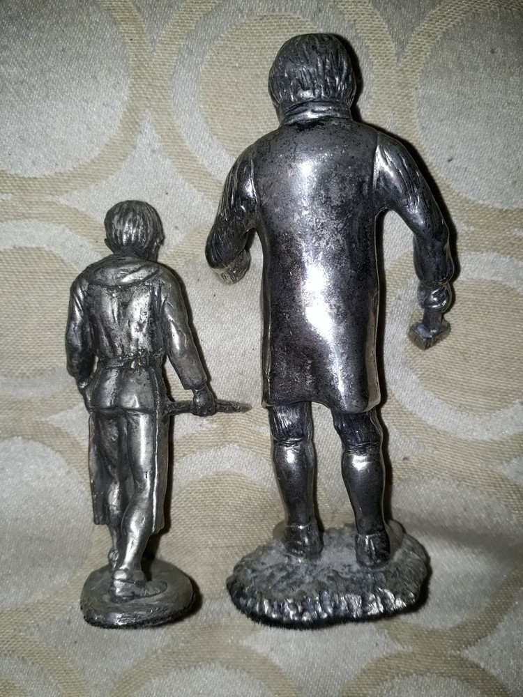 vintage silver plated figures of blacksmith & boy apprentice