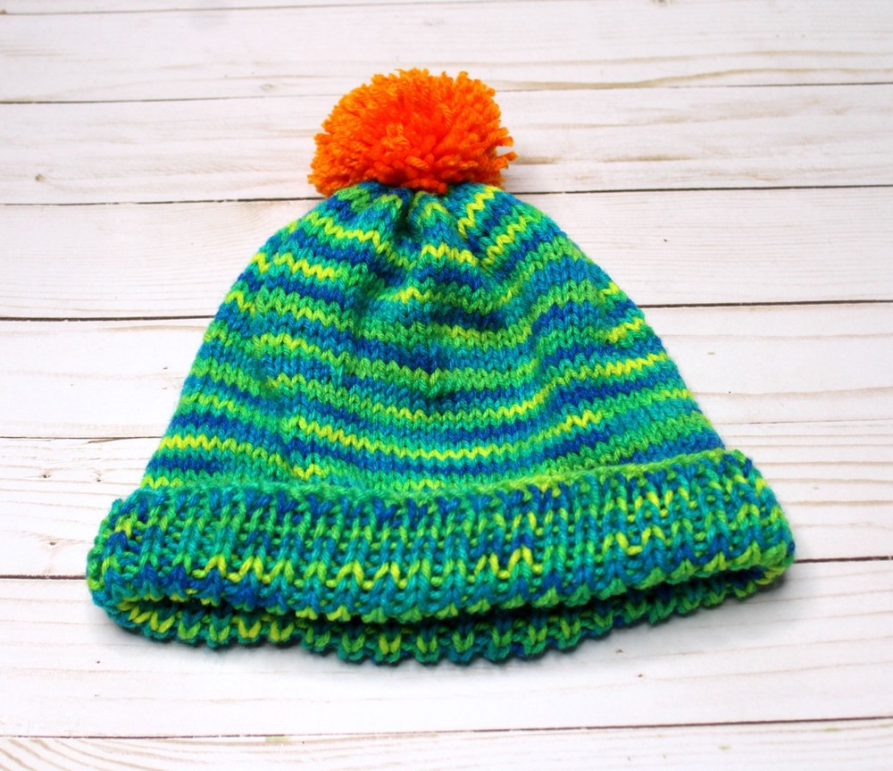 Hand Crocheted Yarn Blend Hat with Orange Pom Pom