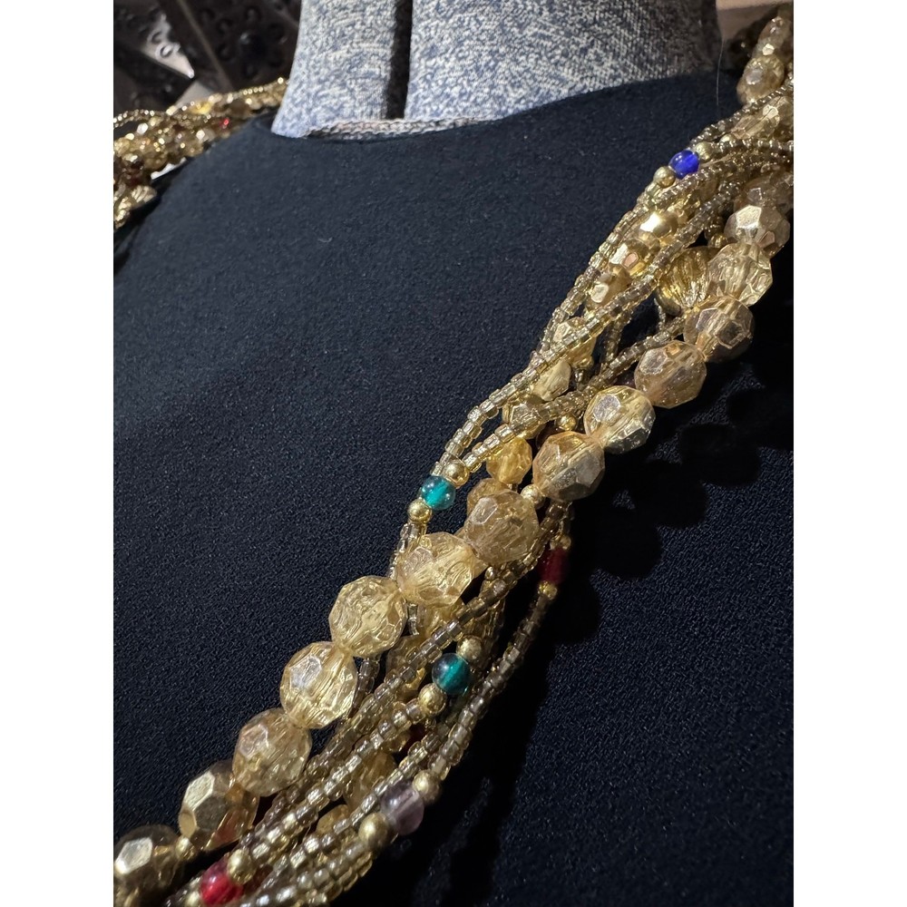 Layered gold statement necklace with major texture and movement