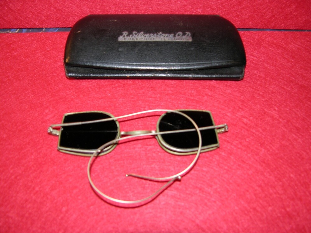Antique welding glasses with case