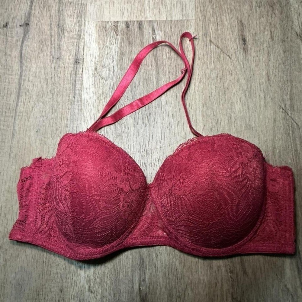 Red lace balconette bra with adjustable straps and padding. Size: 36C