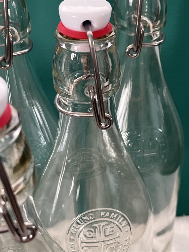 Six Empty Wine Bottles With Stoppers Clear Glass