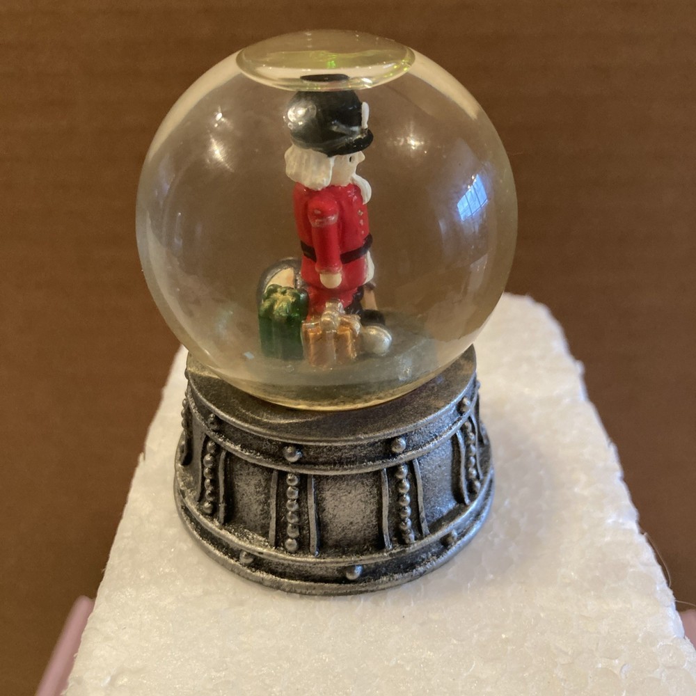 Mini Nutcracker Snow Globe With Metal Base Height 2.5 inches