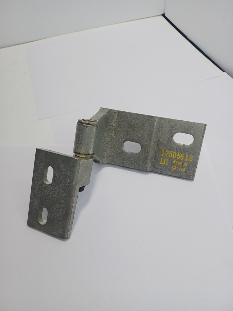 GM 12505613 NOS OEM HINGE PART - LH - LEFT SIDE -